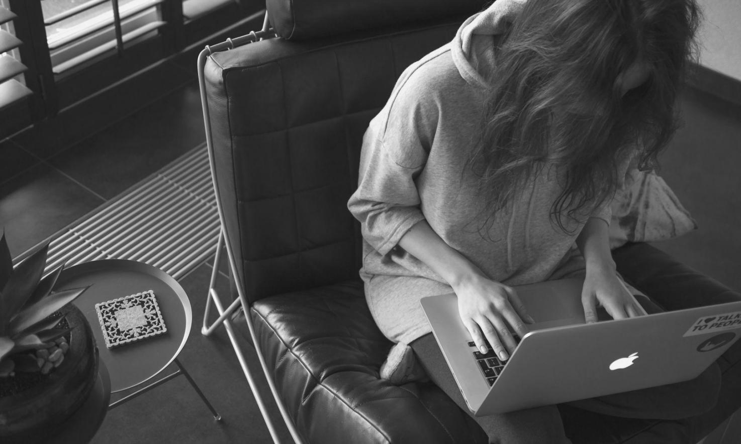 Student presenting research findings using advanced English vocabulary in professional setting